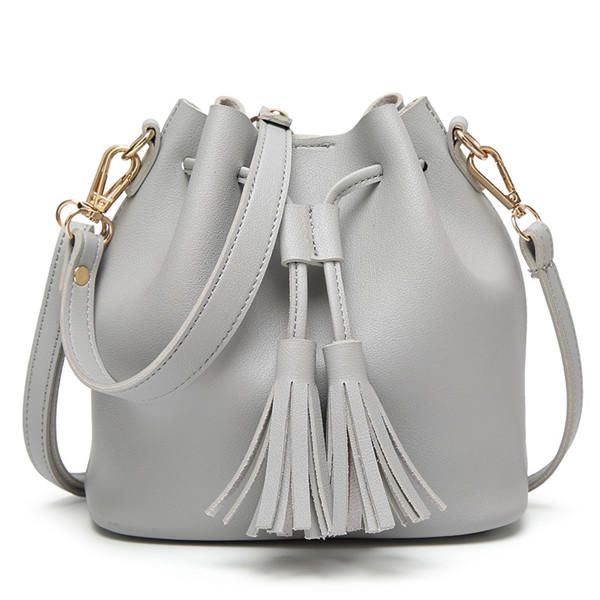 Naiset Pu Nahka Kiristysnauha Bucket Laukut Retro Tupsu Olkalaukut Crossbody Laukut