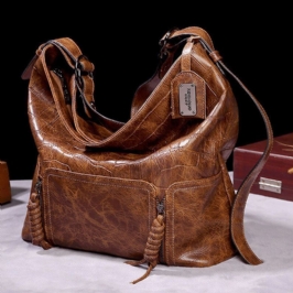 Naisten Vintage Keinonahkainen Suuri Tilavuus Ämpärilaukku Yksivärinen Crossbody Laukku