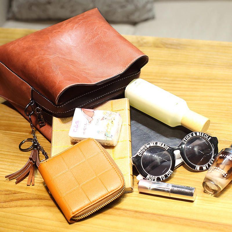 Miesten Naisten Vintage Keinonahkainen Crossbody Laukku Olkalaukut Bucket Bag Crossbody Bag